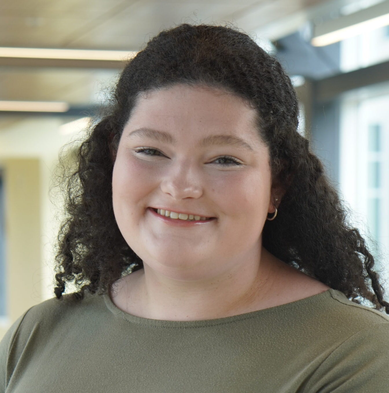 College aged woman smiling